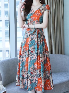 女性用の明るい花柄プリントマキシドレス - ルーズフィット、Vネック、袖なし、バケーションやカジュアルな衣装に最適、カジュアルな衣装|明るいプリント|ルーズフィットドレス